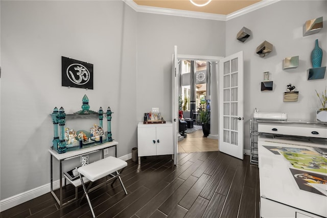 interior space featuring ornamental molding, wood tiled floor, baseboards, and french doors