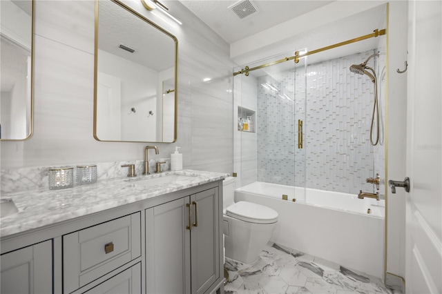 bathroom with enclosed tub / shower combo, toilet, marble finish floor, and visible vents