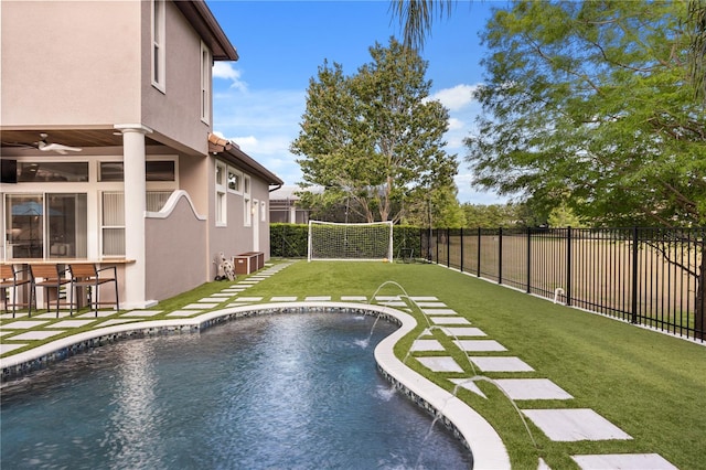 view of pool with central AC, a patio, a fenced backyard, a fenced in pool, and a ceiling fan