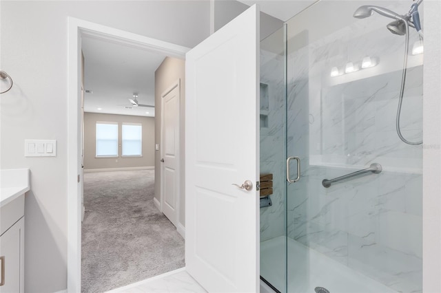 7565 Laureate Blvd Unit 3408, Orlando, FL 32827 - bathroom with a marble finish shower, vanity, and baseboards