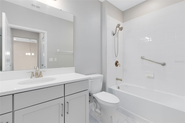 7565 Laureate Blvd Unit 3408, Orlando, FL 32827 - full bath with toilet, vanity, marble finish flooring, and washtub / shower combination