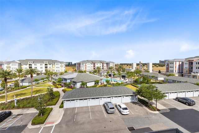 7565 Laureate Blvd Unit 3408, Orlando, FL 32827 - aerial perspective of suburban area with a pool area