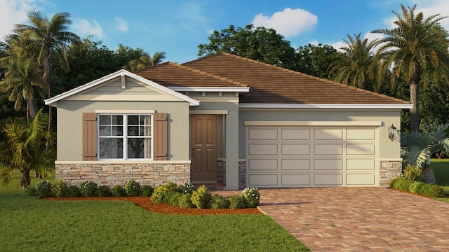view of front of home featuring stone siding, a front lawn, a garage, and decorative driveway