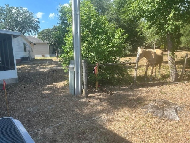 1707 E Schwartz Blvd, Lady Lake, FL 32159 - view of yard featuring cooling unit