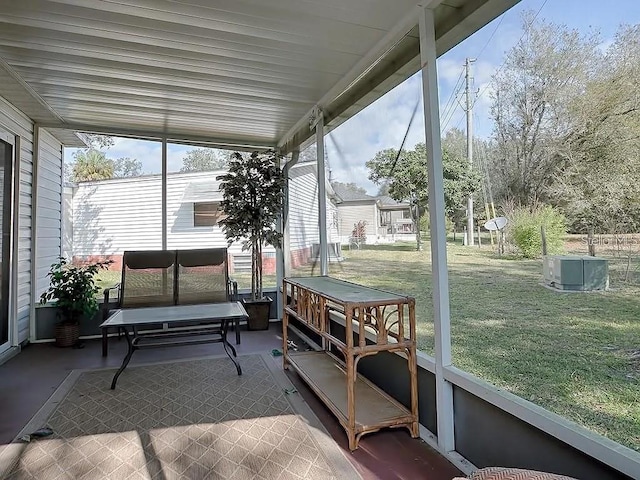 1707 E Schwartz Blvd, Lady Lake, FL 32159 - sunroom / solarium featuring vaulted ceiling and an outdoor hangout area