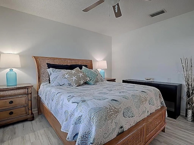 1707 E Schwartz Blvd, Lady Lake, FL 32159 - bedroom featuring light wood-style flooring and a ceiling fan