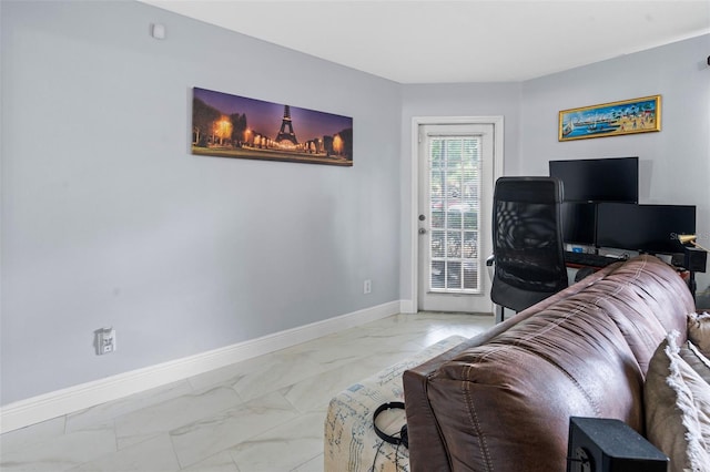 living area with marble finish floor and baseboards