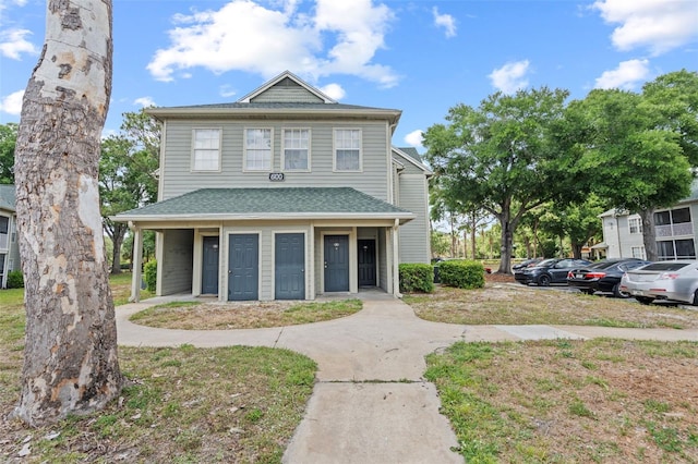 view of front of home featuring uncovered parking