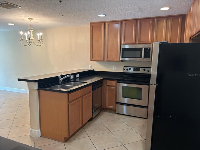 135 Heritage Park St, Winter Springs, FL 32708 - kitchen with light tile patterned floors, visible vents, appliances with stainless steel finishes, and a sink