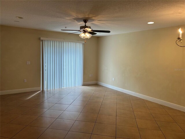 135 Heritage Park St, Winter Springs, FL 32708 - spare room with recessed lighting, a textured ceiling, baseboards, ceiling fan, and tile patterned flooring
