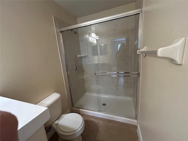 135 Heritage Park St, Winter Springs, FL 32708 - full bath with tile patterned floors, toilet, a stall shower, and vanity