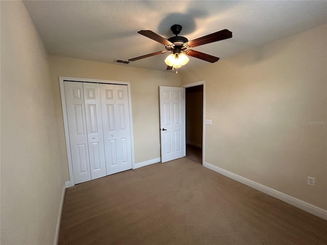 135 Heritage Park St, Winter Springs, FL 32708 - unfurnished bedroom with a closet, carpet floors, visible vents, baseboards, and ceiling fan