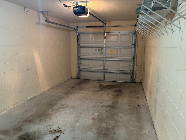 135 Heritage Park St, Winter Springs, FL 32708 - garage with concrete block wall and a garage door opener