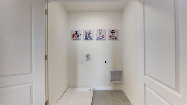 2975 Brie Hammock Bnd, Saint Cloud, FL 34773 - laundry room with laundry area, light tile patterned floors, electric dryer hookup, baseboards, and hookup for a washing machine