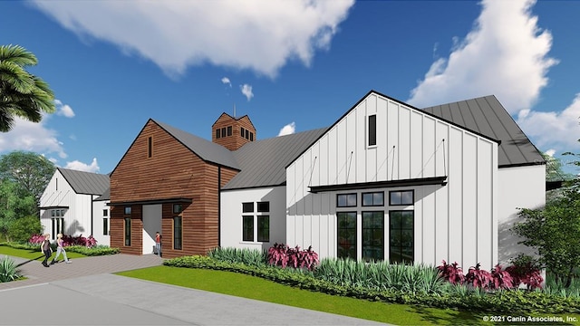 2975 Brie Hammock Bnd, Saint Cloud, FL 34773 - exterior space with board and batten siding, metal roof, and a standing seam roof