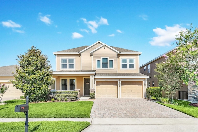 craftsman-style house featuring a porch, driveway, a garage, stucco siding, and a front yard