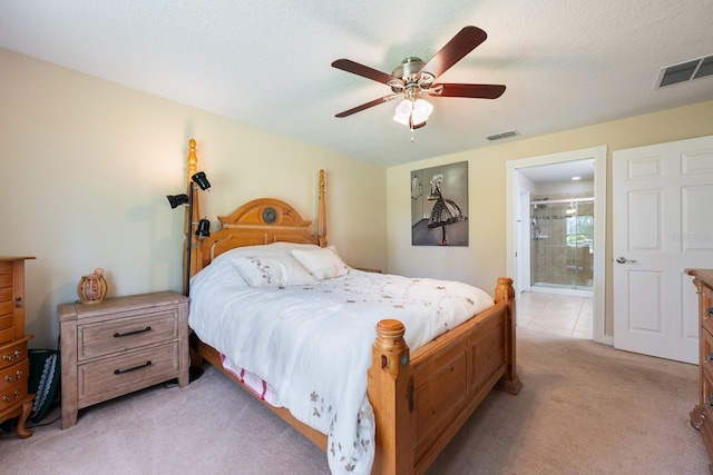 11908 Fiore Dr Unit 1, Orlando, FL 32827 - bedroom featuring light colored carpet, connected bathroom, and ceiling fan