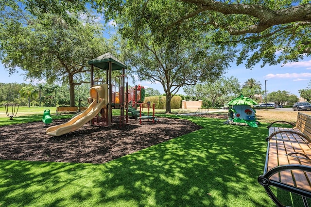 11908 Fiore Dr Unit 1, Orlando, FL 32827 - community jungle gym featuring a lawn