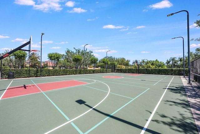 11908 Fiore Dr Unit 1, Orlando, FL 32827 - view of basketball court with community basketball court and fence