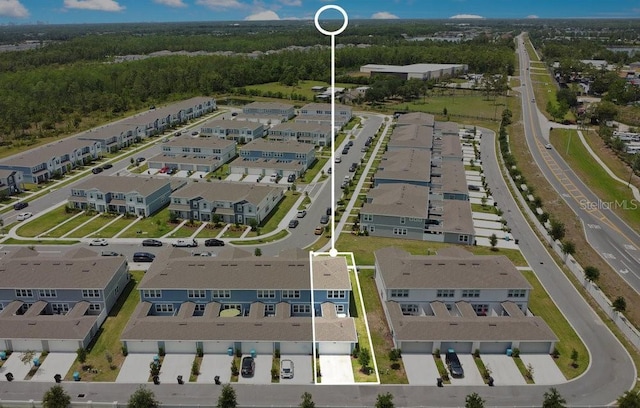 10940 Leafshore Loop, Orlando, FL 32829 - aerial view of residential area with a forest