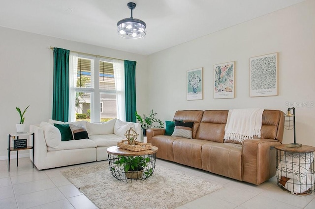 10940 Leafshore Loop, Orlando, FL 32829 - living area with light tile patterned floors