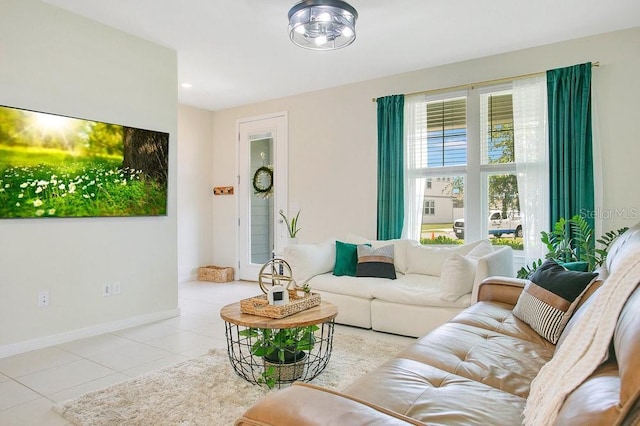 10940 Leafshore Loop, Orlando, FL 32829 - living room with tile patterned flooring, baseboards, and recessed lighting