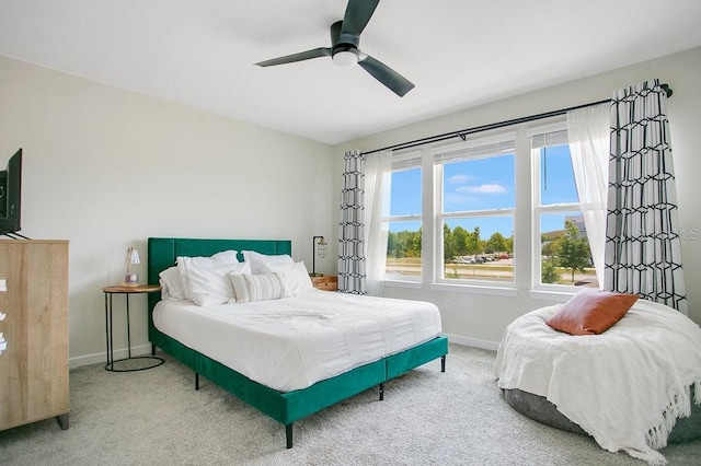 10940 Leafshore Loop, Orlando, FL 32829 - bedroom featuring baseboards, carpet floors, and a ceiling fan
