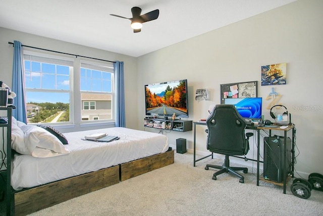 10940 Leafshore Loop, Orlando, FL 32829 - carpeted bedroom featuring baseboards and a ceiling fan