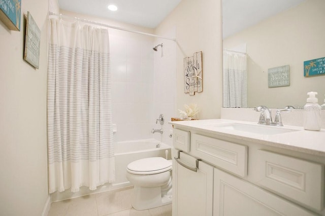 10940 Leafshore Loop, Orlando, FL 32829 - full bathroom with tile patterned flooring, shower / bathtub combination with curtain, toilet, vanity, and recessed lighting