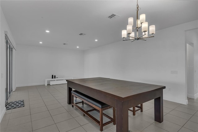 dining area featuring light tile patterned flooring, recessed lighting, a chandelier, and baseboards
