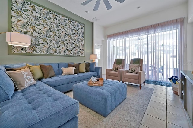 2624 Daulby St, Kissimmee, FL 34747 - living room with a ceiling fan and light tile patterned floors