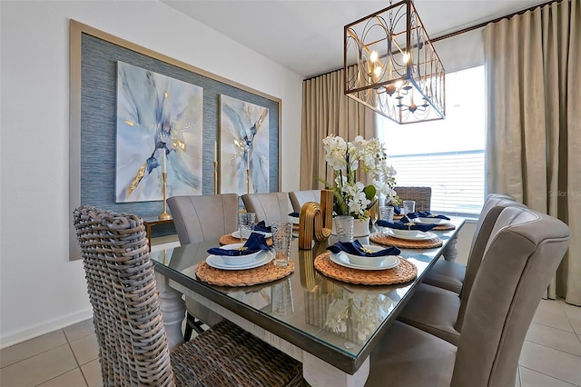 2624 Daulby St, Kissimmee, FL 34747 - dining room with a chandelier, tile patterned floors, plenty of natural light, and baseboards