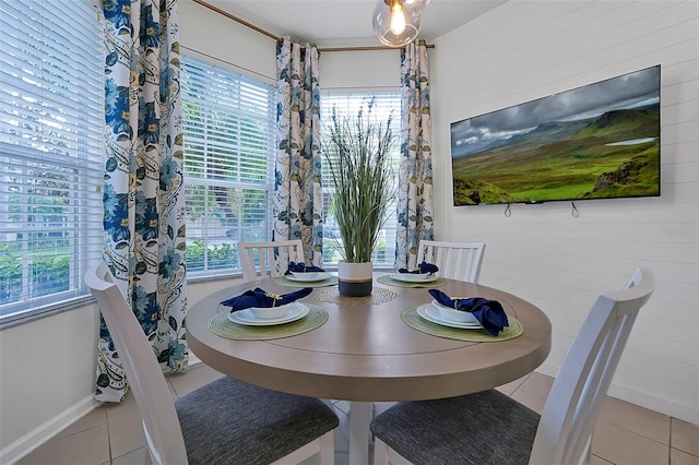 2624 Daulby St, Kissimmee, FL 34747 - dining space featuring tile patterned floors and baseboards