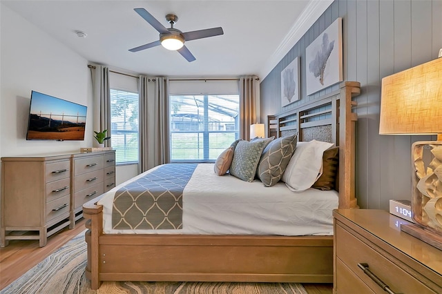 2624 Daulby St, Kissimmee, FL 34747 - bedroom featuring light wood-type flooring and ceiling fan