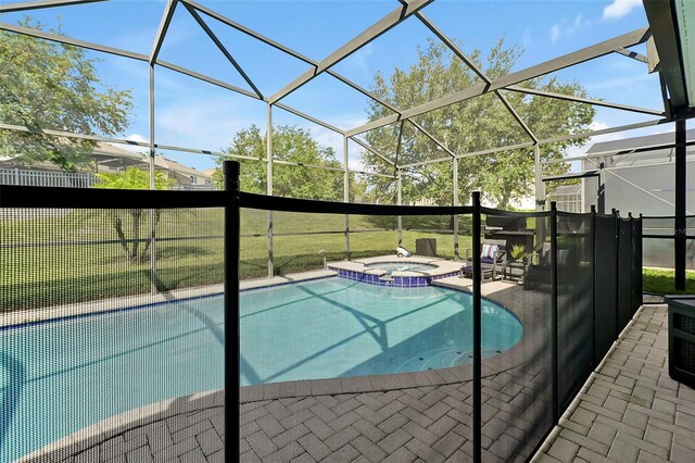 2624 Daulby St, Kissimmee, FL 34747 - view of swimming pool with a patio, a lanai, and a pool with connected hot tub