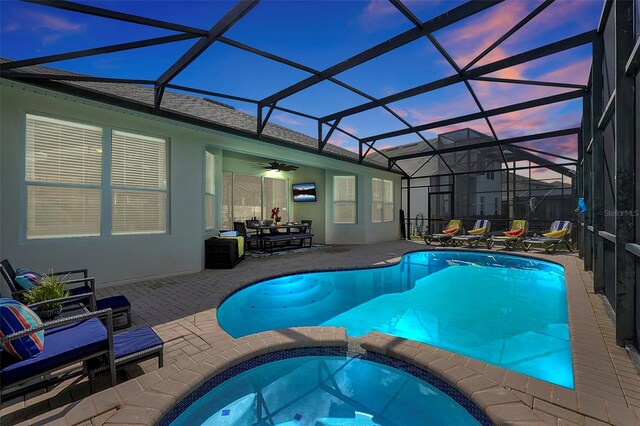 2624 Daulby St, Kissimmee, FL 34747 - view of swimming pool with a pool with connected hot tub, a patio, and ceiling fan