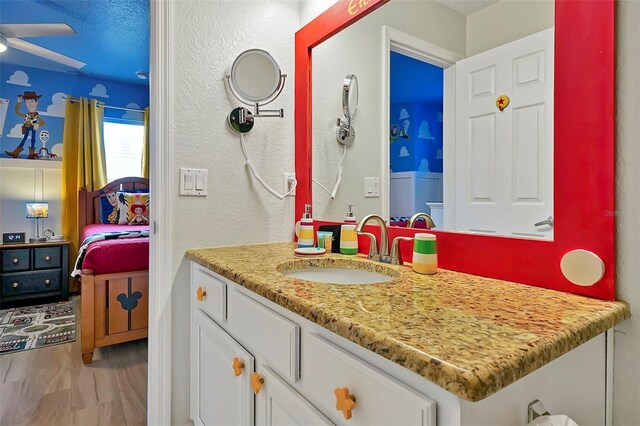 2624 Daulby St, Kissimmee, FL 34747 - bathroom featuring vanity and ceiling fan