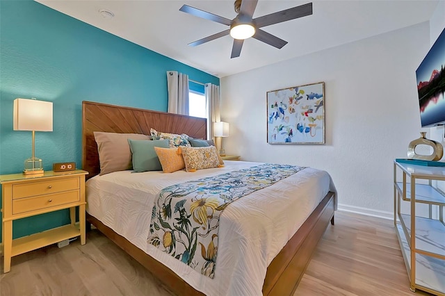 2624 Daulby St, Kissimmee, FL 34747 - bedroom featuring wood finished floors, baseboards, and ceiling fan
