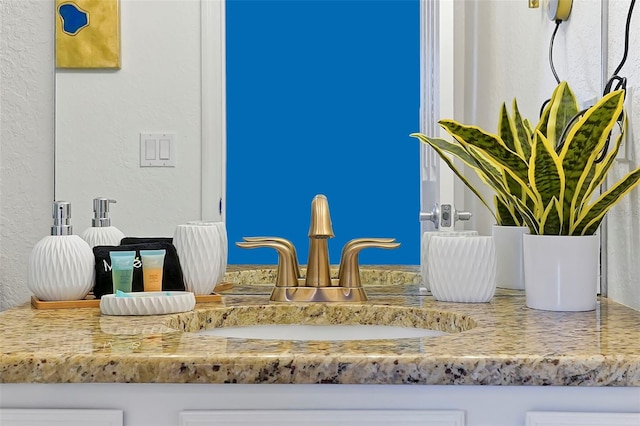 2624 Daulby St, Kissimmee, FL 34747 - bathroom view of a textured wall and vanity