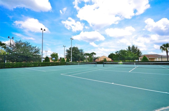 2624 Daulby St, Kissimmee, FL 34747 - view of tennis court featuring community basketball court and fence
