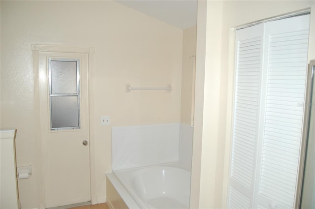 1644 Cypress Woods Cir, Saint Cloud, FL 34772 - bathroom featuring a bath and baseboards