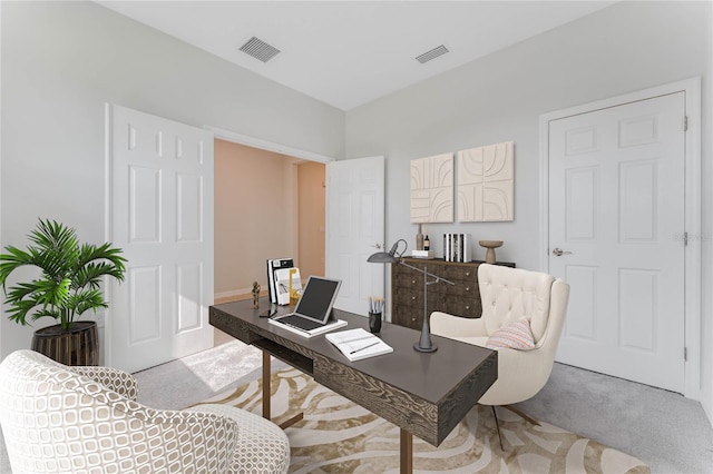 office featuring carpet floors and visible vents