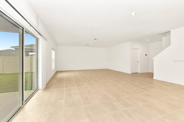 4792 Vellacito Way, Davenport, FL 33897 - unfurnished room with light tile patterned flooring and recessed lighting