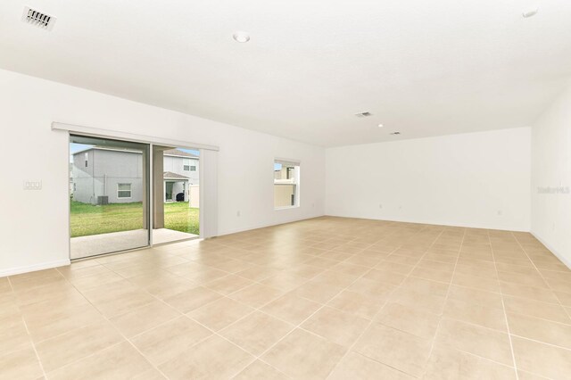 4792 Vellacito Way, Davenport, FL 33897 - unfurnished room featuring light tile patterned flooring and visible vents