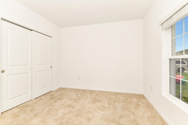 4792 Vellacito Way, Davenport, FL 33897 - unfurnished bedroom with multiple windows, carpet, and baseboards