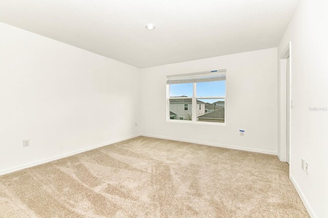 4792 Vellacito Way, Davenport, FL 33897 - unfurnished room with carpet floors and baseboards