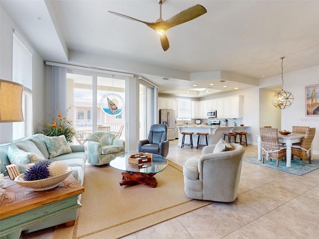 5 Riverwalk Dr Unit 601, New Smyrna Beach, FL 32169 - living room with ceiling fan and light tile patterned flooring