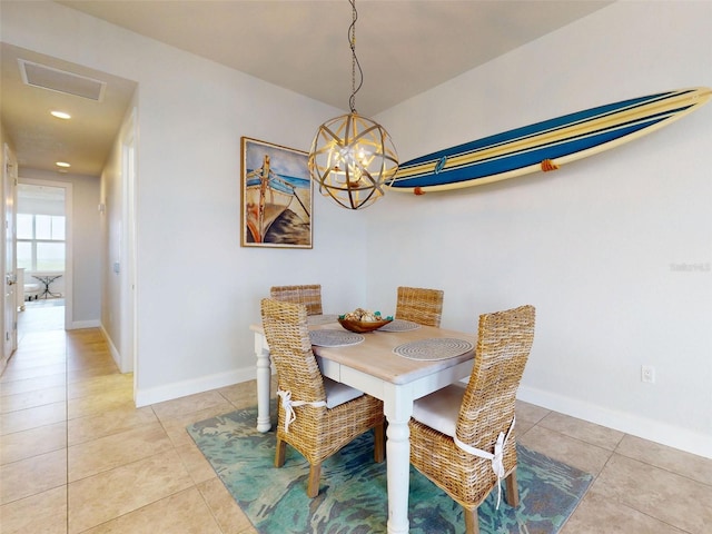 5 Riverwalk Dr Unit 601, New Smyrna Beach, FL 32169 - dining room featuring a chandelier, light tile patterned floors, baseboards, and recessed lighting