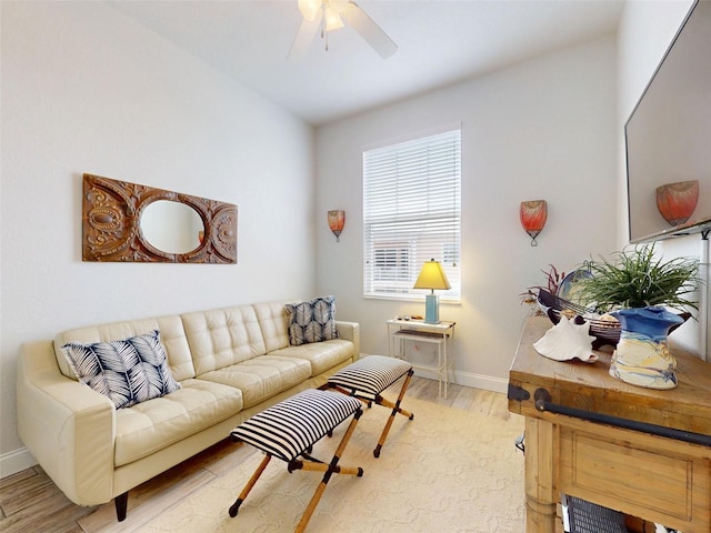 5 Riverwalk Dr Unit 601, New Smyrna Beach, FL 32169 - living room featuring baseboards, light wood finished floors, and ceiling fan