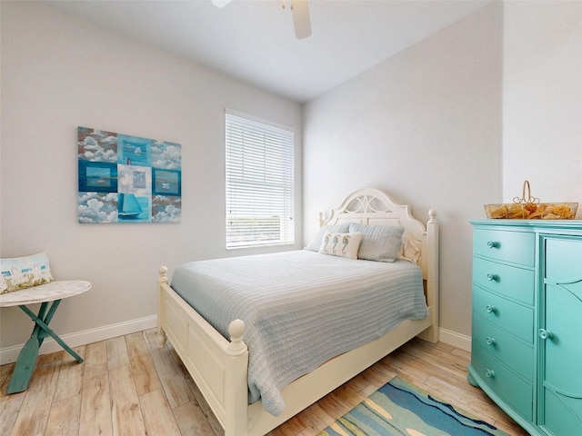5 Riverwalk Dr Unit 601, New Smyrna Beach, FL 32169 - bedroom with light wood-style flooring, baseboards, and ceiling fan